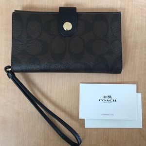 MINT CONDITION Coach wristlet phone holder /wallet